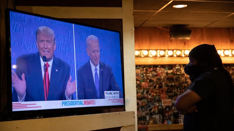 A bartender watches the US presidential debate in Clawson, Michigan. Photograph: Emily Elconin/Bloomberg