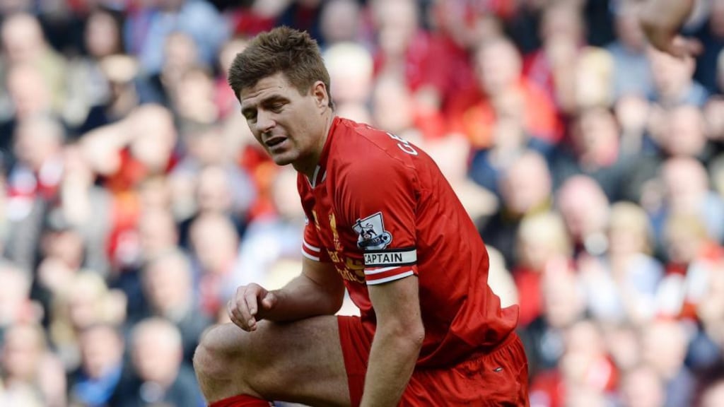 Liverpool’s Steven Gerrard reacts during his team’s costly English Premier League defeat to Chelseat at Anfiled. Photo: Peter Powell/EPA