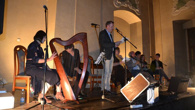 Musicians, writers and translators in Strahov Monastery with master of ceremonies Pádraig Ó Liatháin. Photograph: Václav Bern