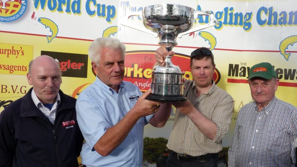 Eugene McCarthy from Galway (3rd left), winner of the 60th World Cup Trout Angling Championship on Lough Mask. From left: Kevin Duffy (Headford); World Cup chairman, Joe Cusack and John P Burke (right), Burkes Boats
