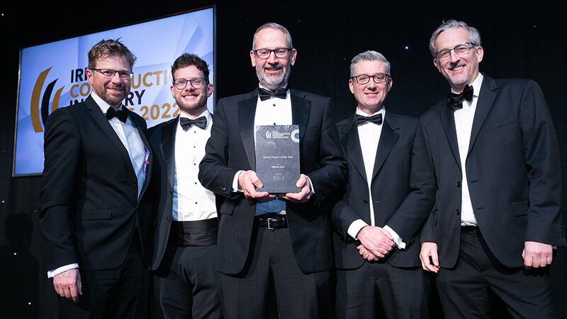 Noel McKernan, general manager, Halt Natural Fire Retardant Treatment, presents the Green Project of the Year award to Coady Architects team.