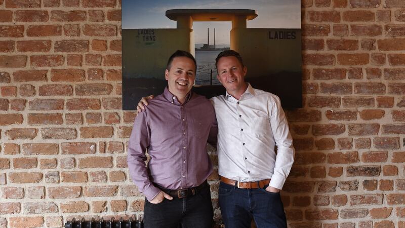 Liam Moloughney, left, with Shane Mitchell.