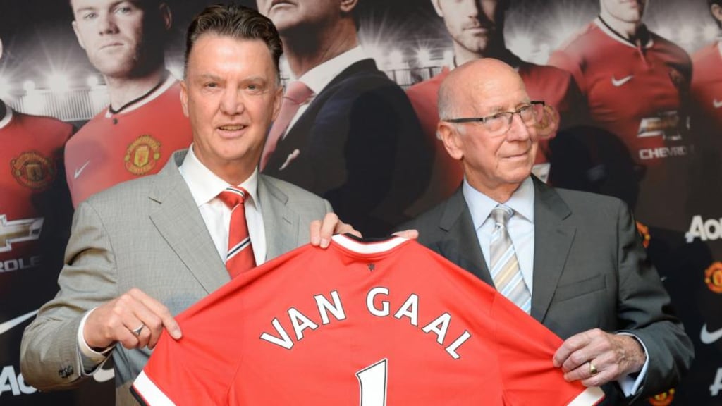 Manchester United manager Louis van Gaal and club ambassador Bobby Charlton during a photocall at Old Trafford, Manchester. Photograph: Martin Rickett / PA Wire