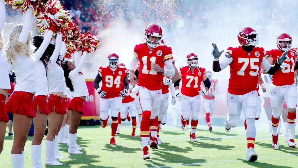 Quarterback Alex Smith (No 11) of Kansas City Chiefs takes the field with teammates prior to the game against the Buffalo Bills in Kansas City, Missouri. Photograph: Jamie Squire/Getty Images
