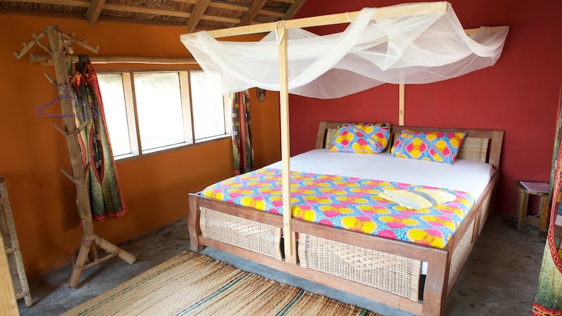 A bedroom at Meet Me There in Keta, Ghana