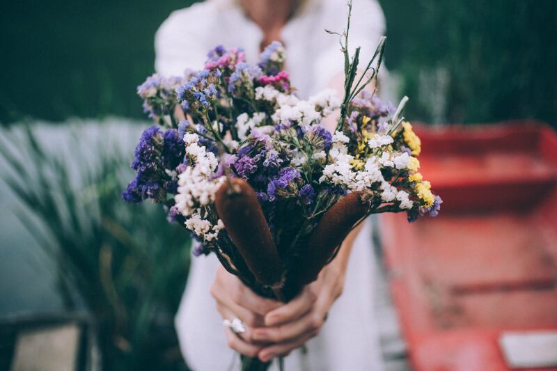 Some dried flowers of ornamental grasses will add a nice contemporary touch. Photograph: Pyrosky/iStock
