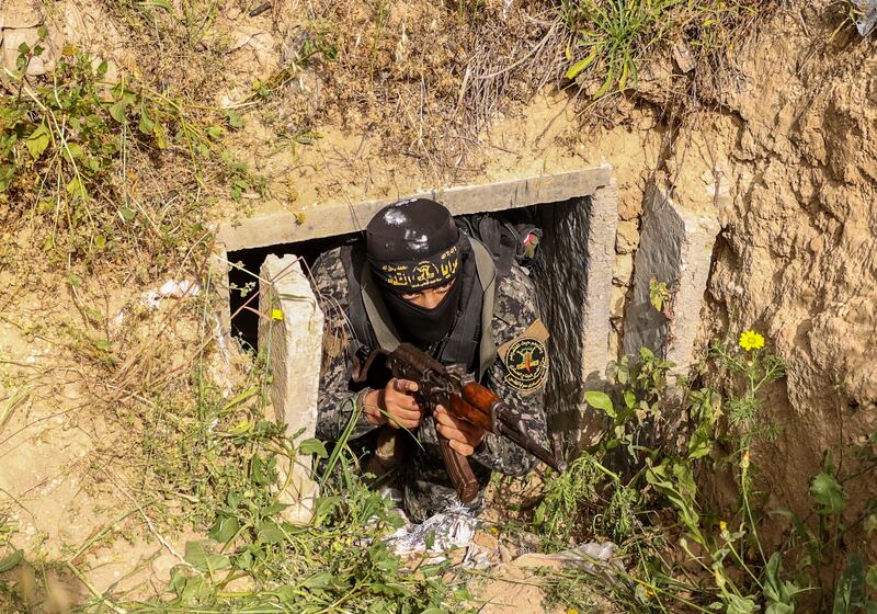 A member of the Palestinian Islamic Jihad militant group exits a tunnel in the Gaza strip during a media tour last April. Photograph: Mahmud Hams/AFP via Getty Images