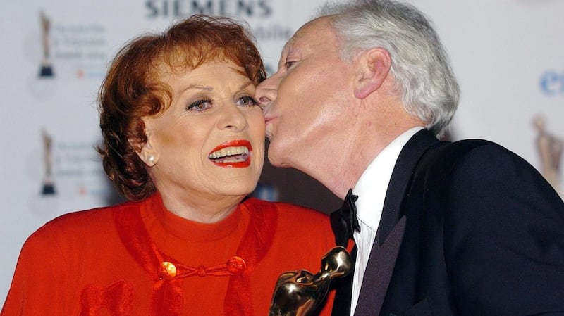Maureen O’Hara, who has died at the age of 95, being kissed by Gay Byrne after he presented her with her lifetime achievement award at the Irish Film & Television Awards. Photograph: Haydn West/PA Wire