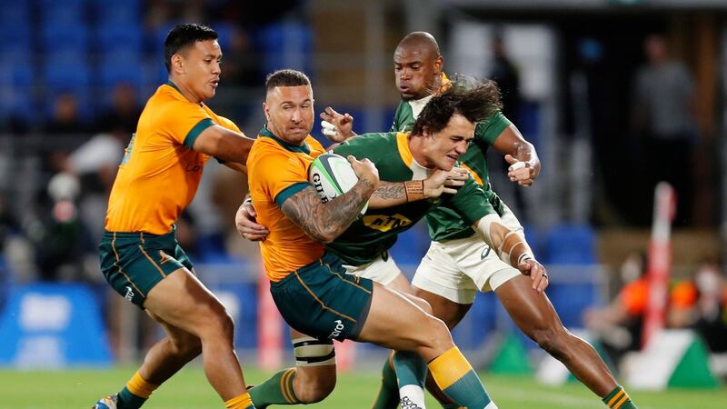 Australia’s Quade Cooper attempts to spin out of a tackle from South Africa’s Franco Mostert during the Rugby Championship match at Cbus Stadium on Australia’s Gold Coast. Photograph: Regi Varghese/EPA