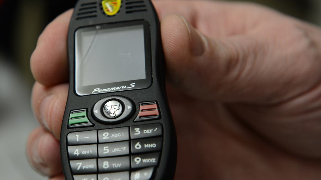 A file image of a phone found in a shoe in Mountjoy Prison in 2013. An investigation has begun into allegations that a solicitor passed a phone to an inmate. Photograph: Cyril Byrne/The Irish Times