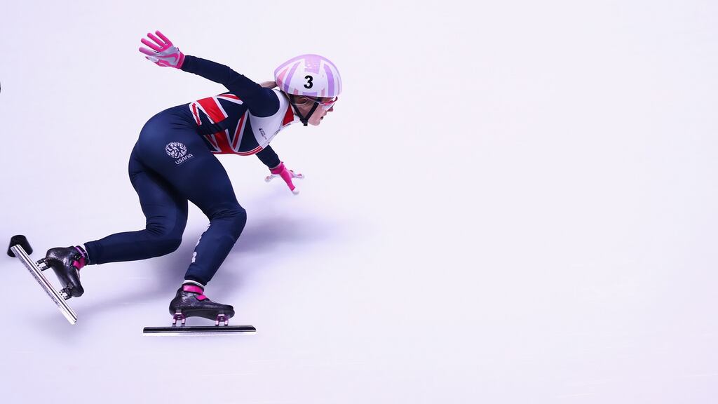 Elise Christie in action during the 1500m at the ISU World Short track Speed Skating Championships in Rotterdam. Photograph: Dean Mouhtaropoulos/Getty Images