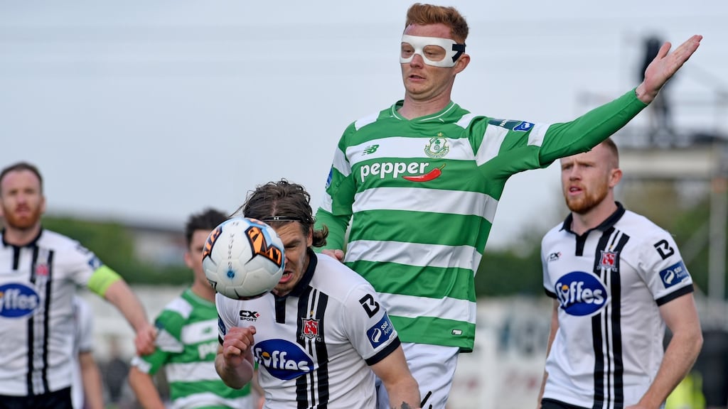 Dundalk defender Niclas Vemmelund and Shamrock Rovers’s Gary Shaw in action during last night’s FAI Cup semi-final at Oriel Park. Photograph: Ciaran Culligan/Inpho