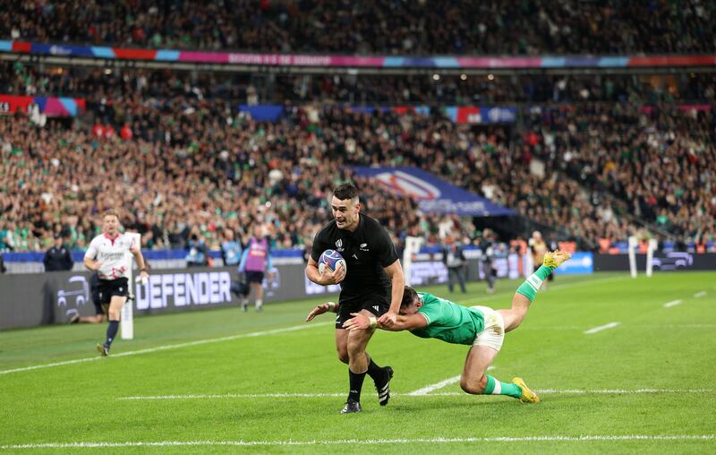 Will Jordan scores New Zealand's third try during the victory over Ireland in the Rugby World Cup France quarter-final at Stade de France. Photograph: Warren Little/Getty Images