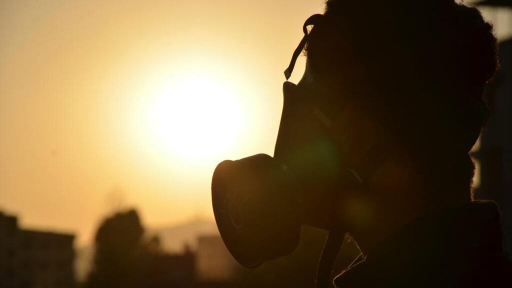 An activist wearing a gas mask is seen in the Zamalka area, where activists say chemical weapons have been used by forces loyal to President Bashar Al-Assad in the eastern suburbs of Damascus. Photograph: Bassam Khabieh/Reuters