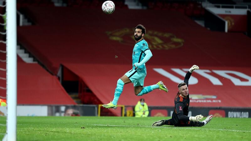 Mohamed Salah opens the scoring for Liverpool. Photograph: Getty Images