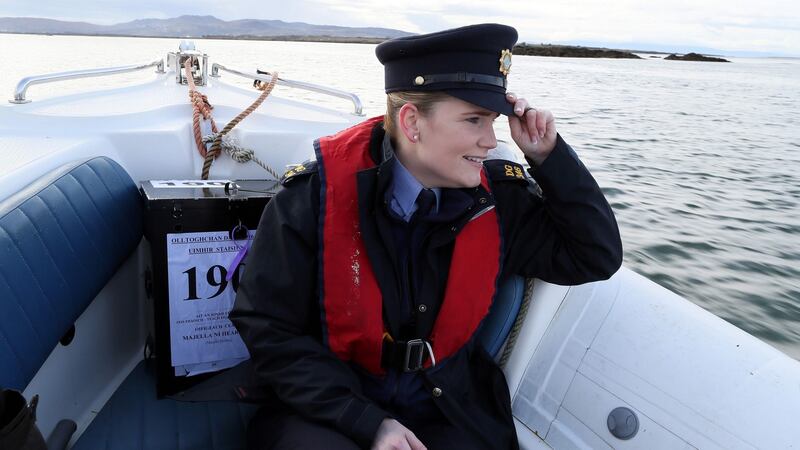 Garda Margaret Byrne escorts a ballot box to the residents of Inishfree Island off the west coast of Ireland, on February 25, 2016, ahead of Ireland’s general election. The inhabitants of Inishfree Island voted Thursday, a day earlier than the rest of the country who will vote on Friday February 26, 2016. / AFP / PAUL FAITHPAUL FAITH/AFP/Getty Images
