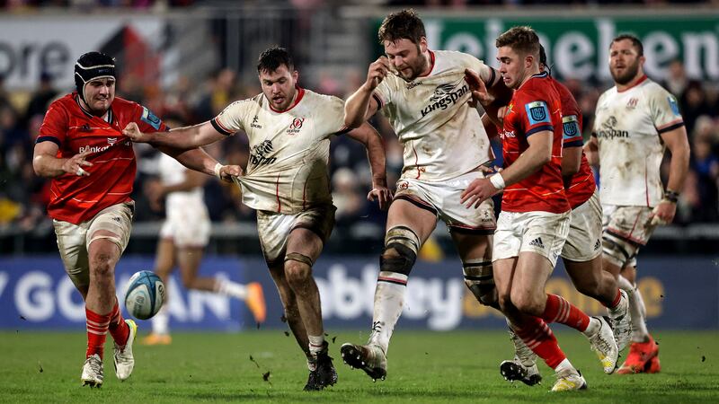 Ulster's Sean Reffell and Iain Henderson compete for a loose ball with Alex Kendellen and Jack Crowley of Munster at Kingspan Stadium in Belfast on New Year's Day. Photograph: Ben Brady/Inpho