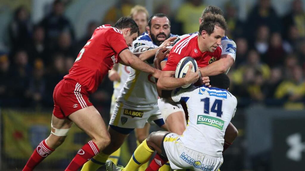 Munster’s Andrew Smith is tackled by Clermont Auvergne’s Noa Nakaitaci in the Champions Cup. The Australian believes a home semi-final in the Pro12 “could really set up” Munster’s year. Photograph: Billy Stickland/Inpho