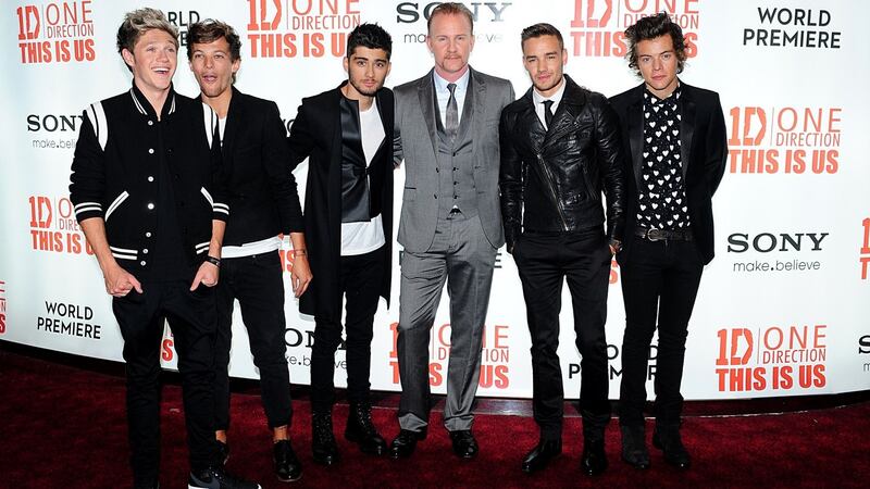 Morgan Spurlock with One Direction's Niall Horan, Zayn Malik, Louis Tomlinson, Harry Styles and Liam Payne. Photograph: Ian Whyte/PA