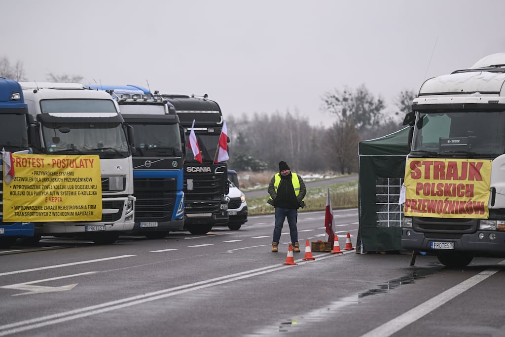 A Polish truck driver stands at blockade on the Polish-Ukrainian border crossing. Photograph: Omar Marques/Getty Images