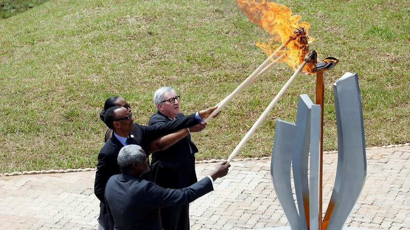 African Union Commission Chairperson Moussa Faki Mahamat, Rwandan President Paul Kagame, Jeannette Kagame and European Commission President Jean-Claude Juncker, light the flame of hope during a commemoration ceremony of the 25th anniversary of the genocide at the Genocide Memorial in Gisozi in Kigali, Rwanda on April 7th, 2019. Photograph: Baz Ratner/Reuters