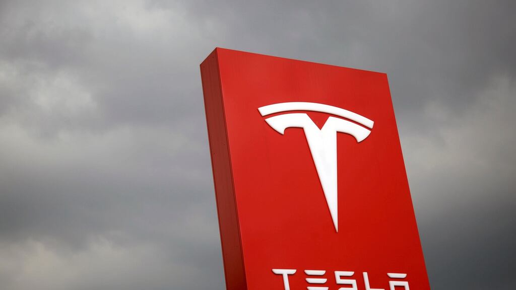 Tesla is increasing output at its US factory, launching production in China, overhauling its US retail and service operations and developing new models. Photograph: Tyrone Siu/Reuters