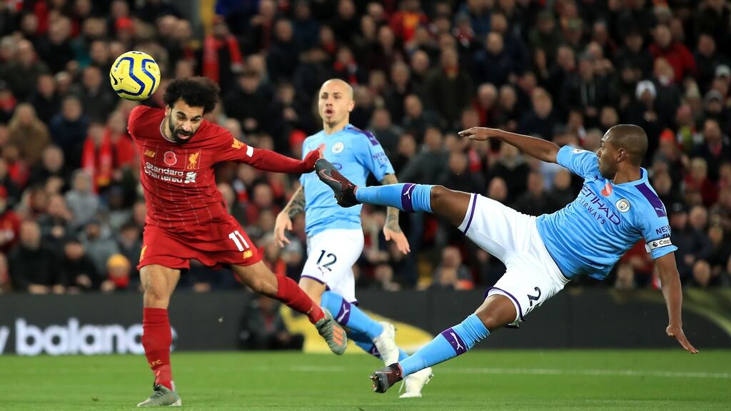 Mohamed Salah scores Liverpool’s second against Manchester City. Photograph: Peter Byrne/PA