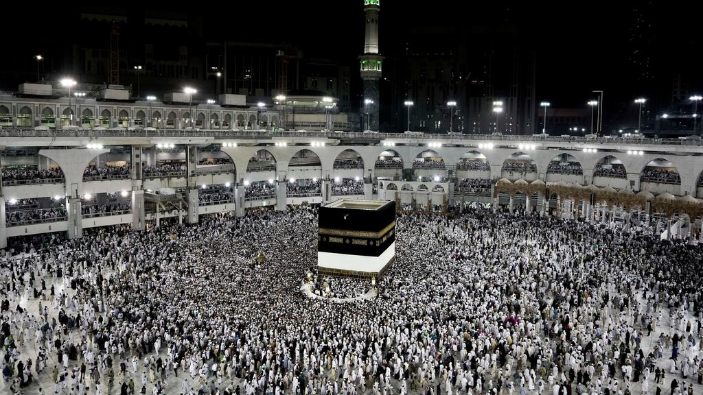 Muslim pilgrims circle the Kaaba, Islam’s holiest shrine, at the Grand Mosque in the Muslim holy city of Mecca, Saudi Arabia. Millions of pilgrims have arrived to Mecca ahead of the annual pilgrimage which begins on Saturday. Photograph: Nariman El-Mofty/AP