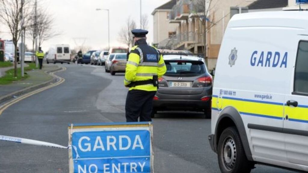 Gardaí at the scene of the siege in the Deerpark housing estate in Tallaght, Dublin on Sunday. Photograph: Eric Luke