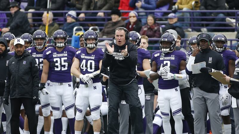 Pat Fitzgerald cheers on his team at Ryan Field in Evanston, Illinois in October 2019. Photograph: Getty Images