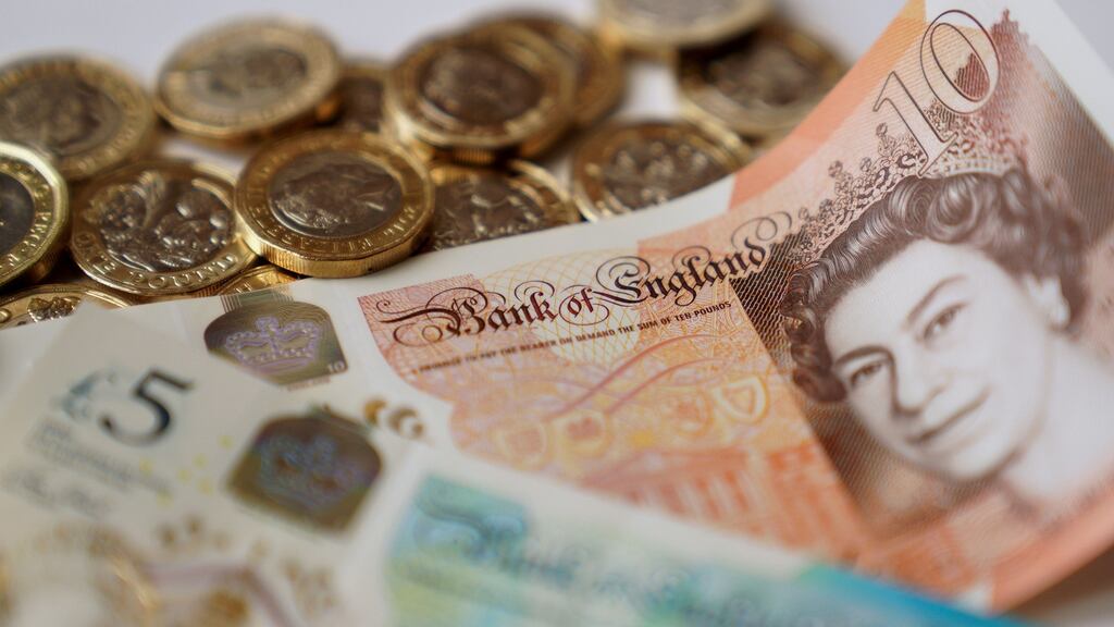 Tighter budgets: UK households felt more pressure on their spending power. Photograph: PA Wire