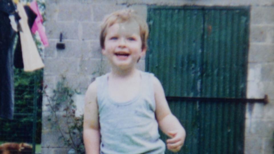 Early years: Jake O’Kane as a young boy, on a trampoline in his garden. Photograph: family collection