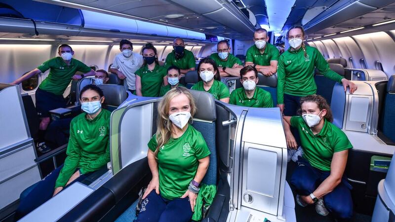 Team Ireland athletes (from left) Ronan Grimes, Patrick Monahan, Katie George Dunlevy, Martin Gordon, Ellen Keane, Eve McCrystal, Eamonn Byrne, Mary Fitzgerald, Nicole Turner, Pat O'Leary, Patrick Flanagan, Gary O'Reilly, Richael Timothy and Róisín Ní Riain onboard their Aer Lingus flight ahead of their Paralympic homecoming at Heathrow Airport in London. Photograph: Sportsfile