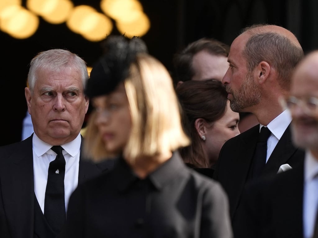 Andrew Mountbatten Windsor (then the duke of York) and Prince William. Photograph: Jordan Pettitt/PA