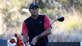 ‘Exhausted’ Woods to adjust schedule after hectic season