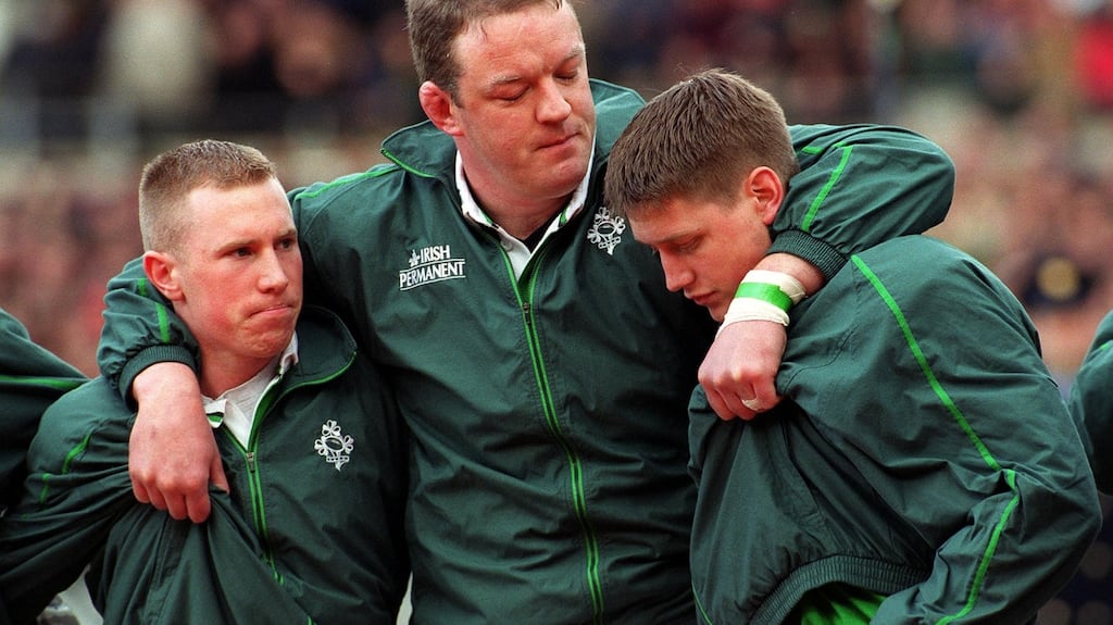 Mick Galway with a young Peter Stringer and Ronan O’Gara during Amhrán na bhFiann prior to a Six Nations game in 2000. Photograph: Patrick Bolger/Inpho