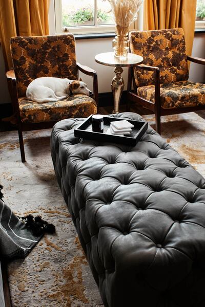 Deep buttoning, soft, hand tipped leather and generous proportions mark The Rest footstool out.