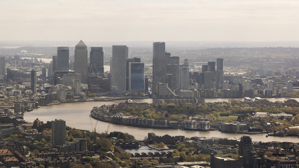 Skyscrapers in the Canary Wharf business district: London-listed mining stocks were among the equities to climb on Friday. Photograph: Jason Alden/Bloomberg