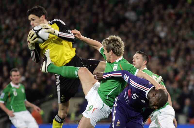 Ireland's Kevin Doyle in action with France's Hugo Lloris and William Gallas at Croke Park. The highest attendance for any of the soccer games at GAA HQ was the 74,103 that turned up to watch the French game. Photograph: Alan Betson