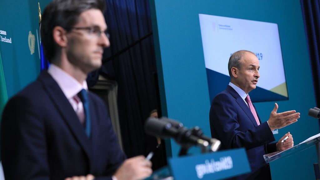 Acting chief medical officer Dr Ronan Glynn and Taoiseach Micheál Martin during a post-Cabinet press briefing at Government Buildings. Photograph: PA Photo