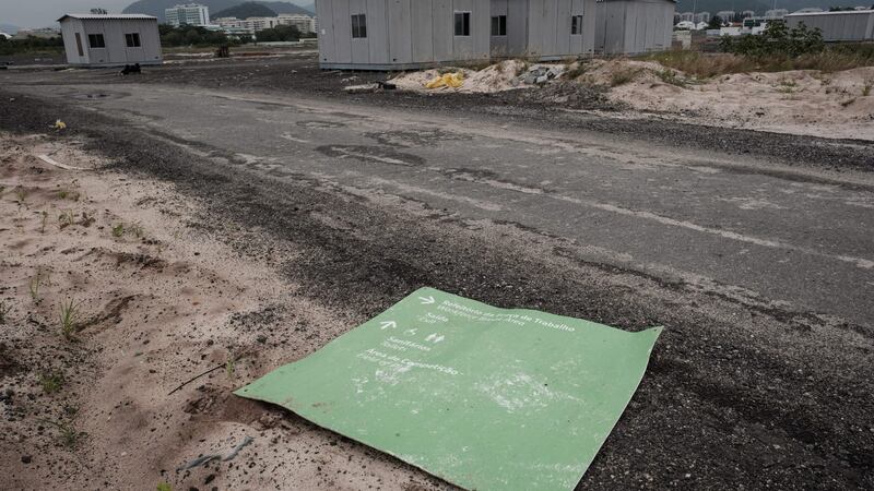 Abandoned prefabricated houses remain next to the Olympic golf course, created and used for the Rio 2016 Olympic Games and now run by the Brazilian Golf Confederation for the public, in Rio de Janeiro, Brazil, on November 23rd, 2016. Photo: Getty Images