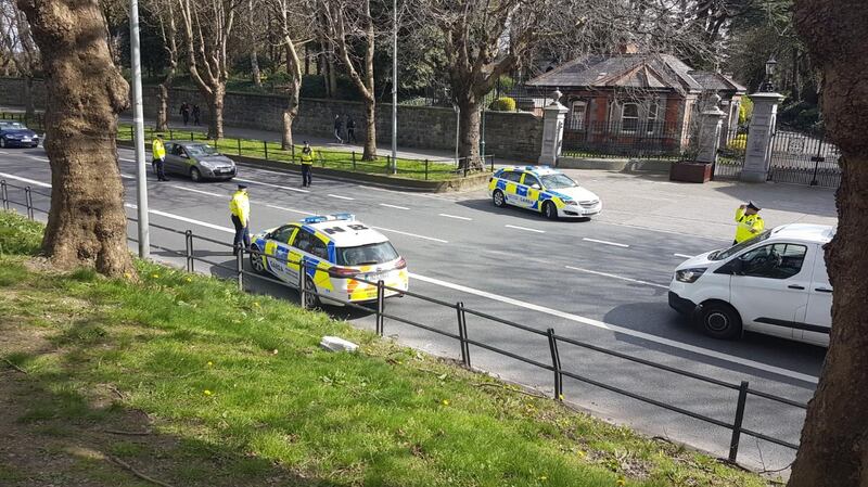 Gardaí man a checkpoint on Saturday as new measures to ensure most people stay at home to prevent the spread of Covid-19 come into effect. Photograph: An Garda Síochána