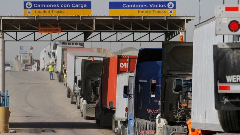 Trucks wait in a queue to cross into the US at the Otay border crossing in Tijuana, Mexico, on February 2nd. Photograph: Jorge Duenes/Reuters