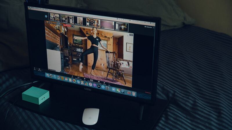 The laptop screen of Carlos Lopez, a ballet master with American Ballet Theater, shows dancer Courtney Lavine, who is taking his class via Zoom, at his apartment in New York. Photograph: Celeste Sloman/The New York Times