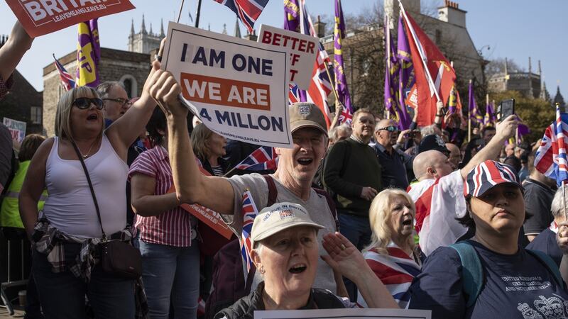 Supporters watch as as a march arrives in Westminster from Fulham in the final leg of the March To Leave rally. Photograph: Dan Kitwood/Getty Images