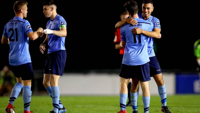 UCD’s Jason McClelland and Evan Osam celebrate at the final whistle of their FAI Cup over Waterford recently. Photo: Ryan Byrne/Inpho
