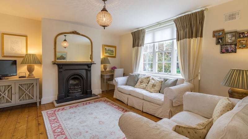 The master bedroom at 88 Iveagh Gardens in Dublin 12. Many of the house’s original features, including the solid wood flooring, have been preserved.