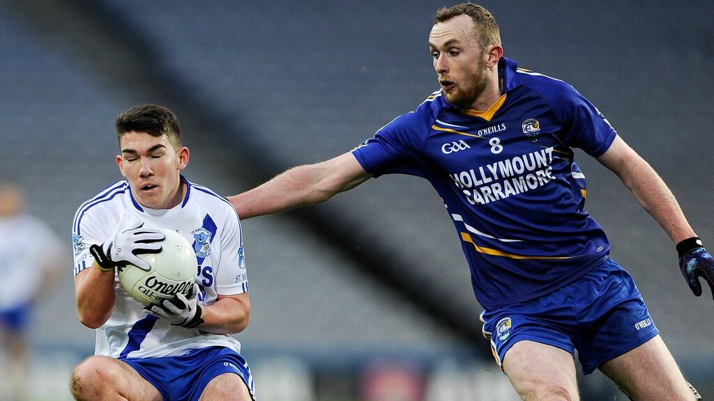 Mary’s Conor O’Shea is tackled by Keelan McNamara of Hollymount-Carramore. Photograph: Inpho