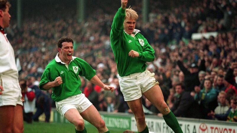 Simon Geoghegan scores a try for Ireland against England during the 1994 Five Nations at Twickenham. Photograph: Billy Stickland/Inpho