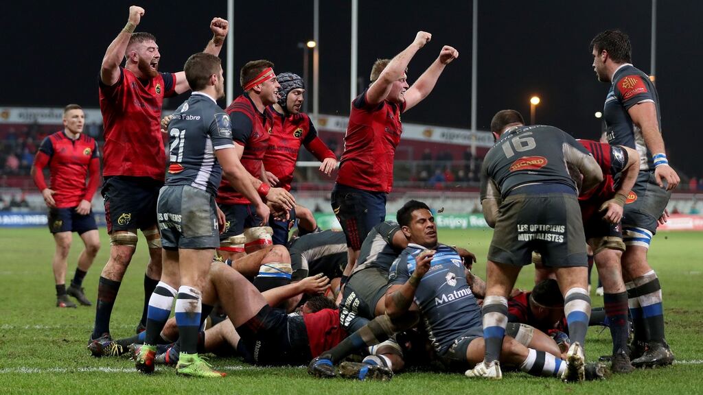 Munster celebrate as James Cronin scores a try against Castres Olympique at Thomond Park. Photograph: Dan Sheriedan/Inpho